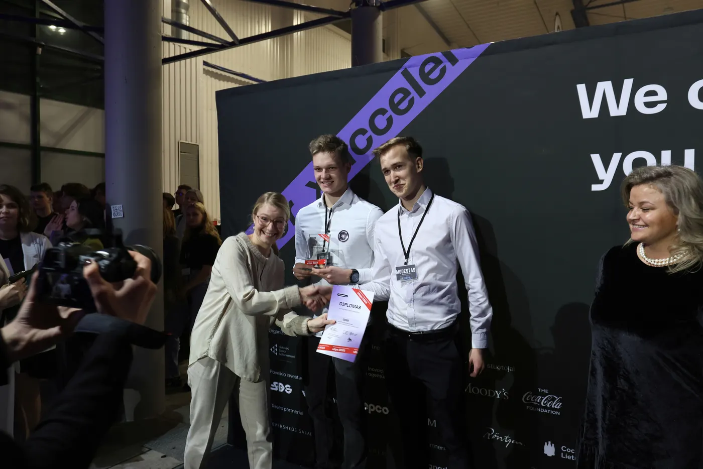 Lukas and Modestas receiving the best teamwork award